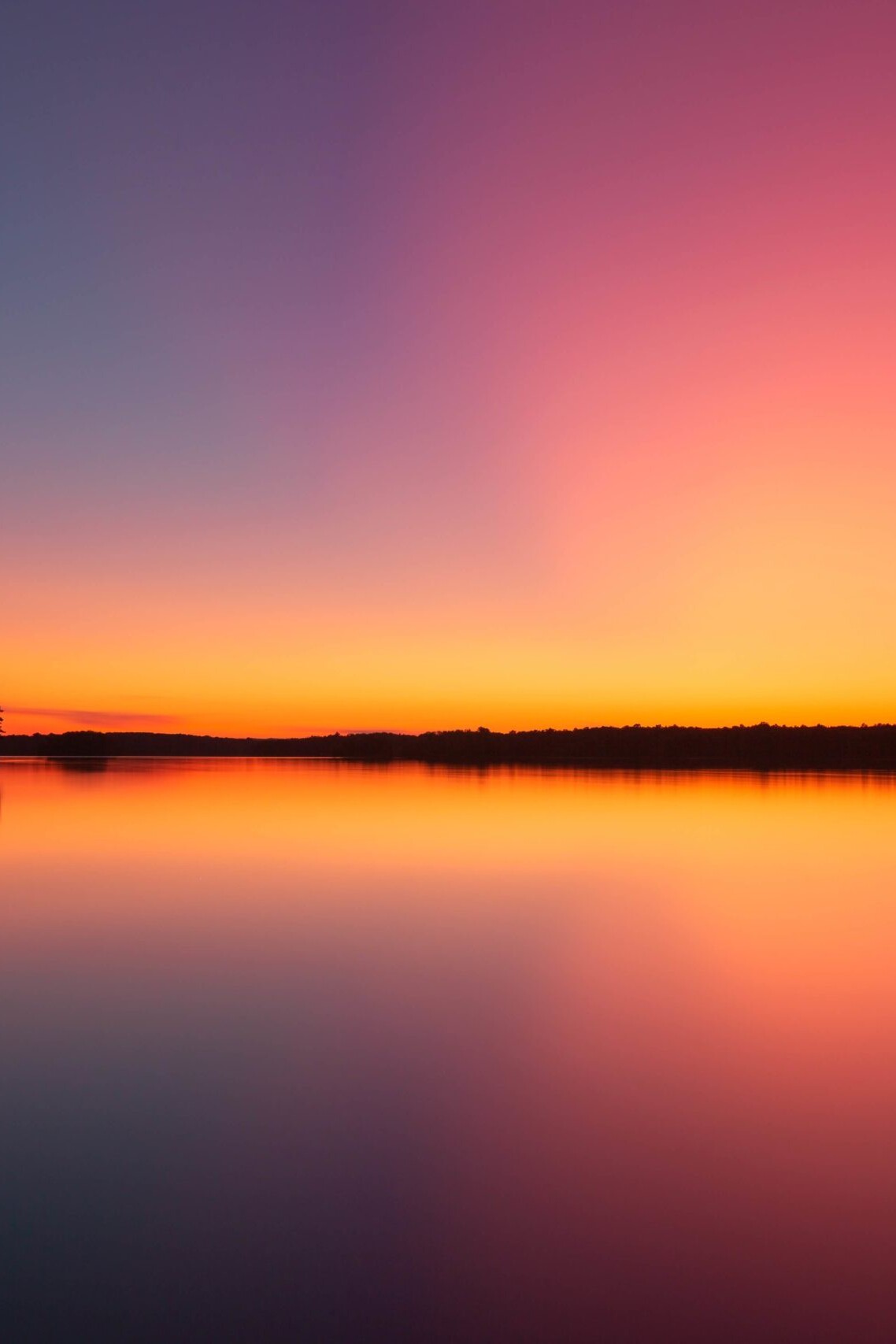 View of a sunset on a lake or river.